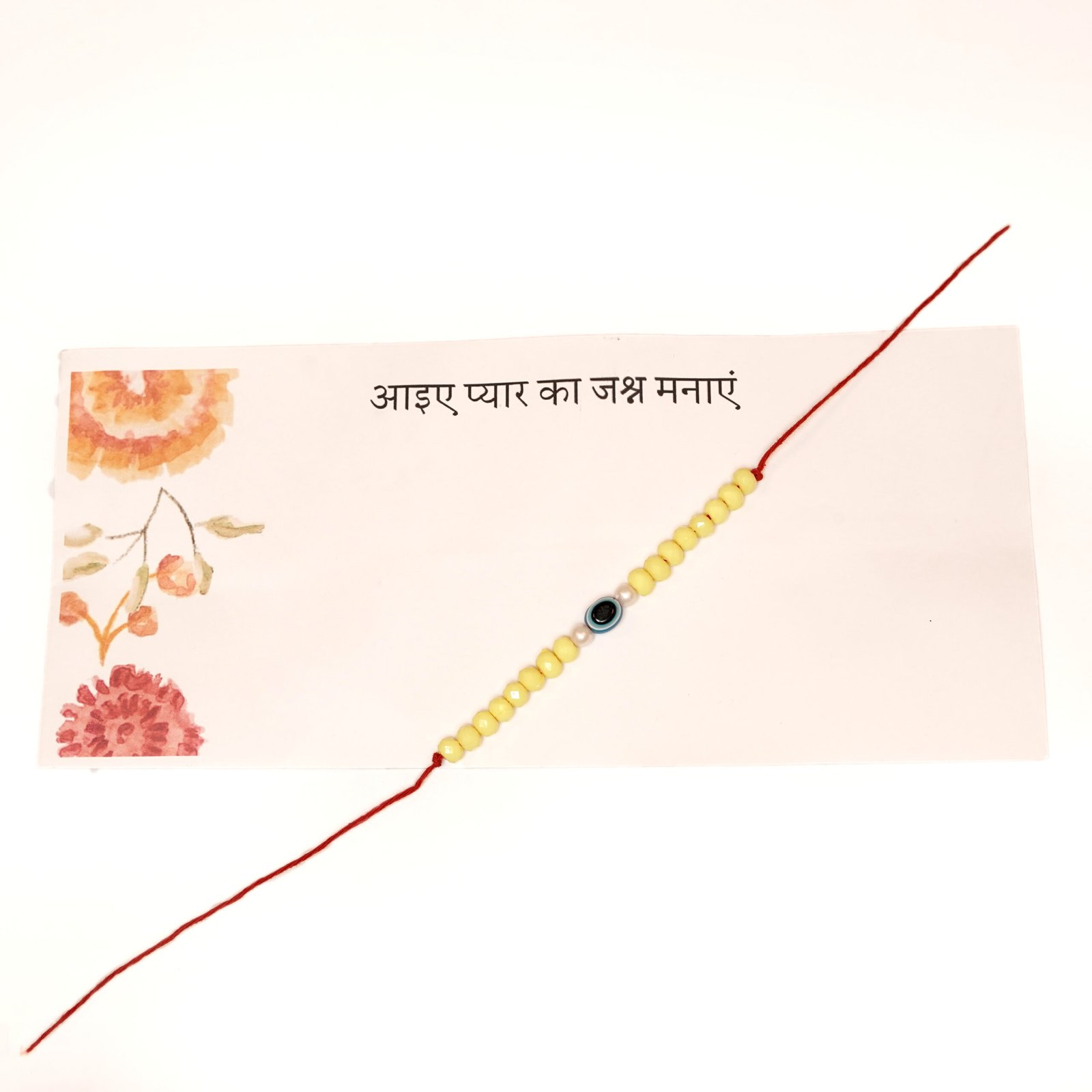 Yellow Evil Eye Rakhi - Image 2